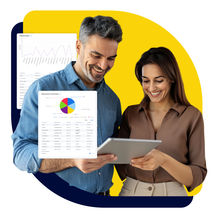 Male and female looking at a tablet together